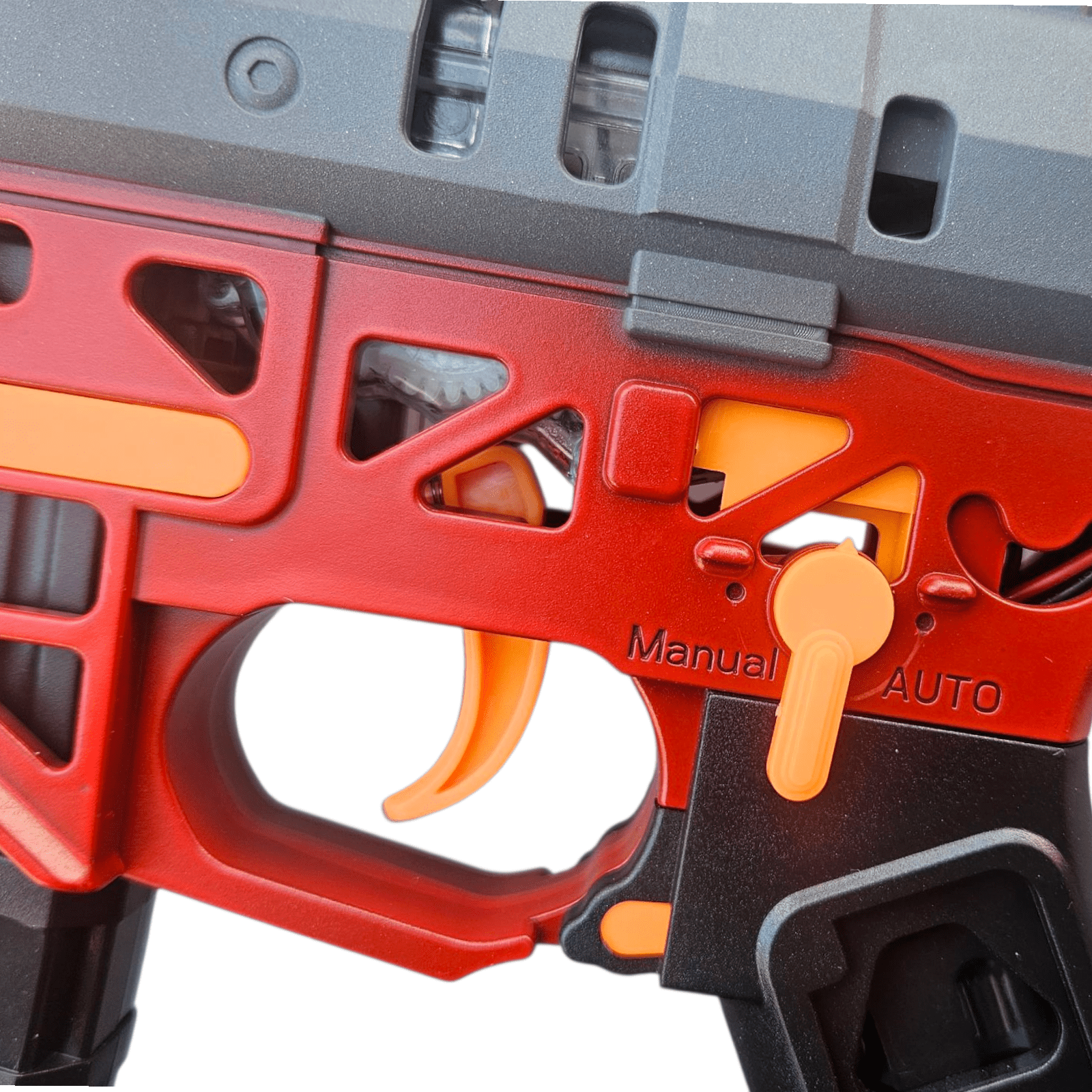 MK6 Luminous Red Heat Gel Blaster detailed view of the trigger and settings.